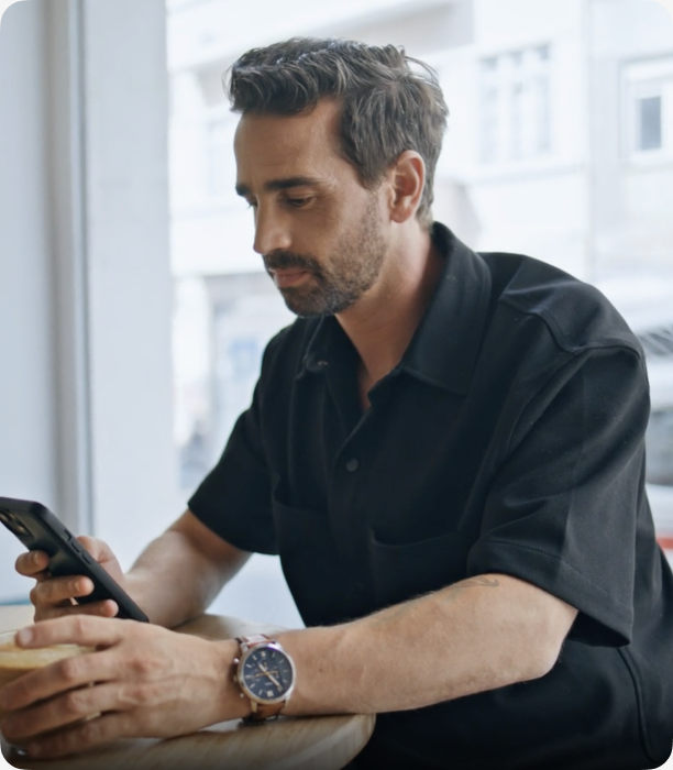 Investor reviewing passive income on smartphone